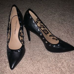 Black pumps with silver studs